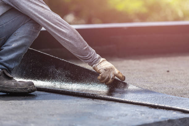 Professional Basement Waterproofing technician working in New Hudson, MI